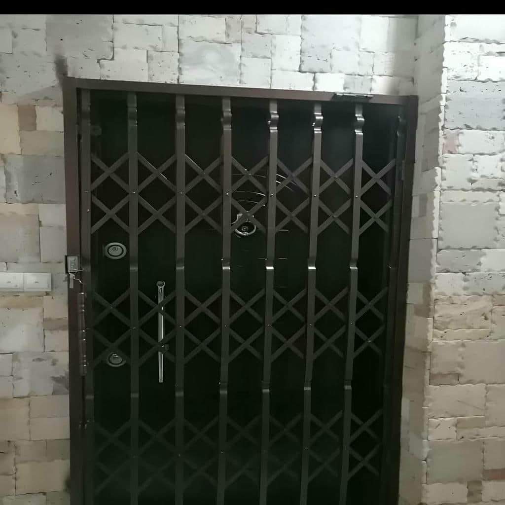 درب آکاردئونی حفاظ خانه در فشم