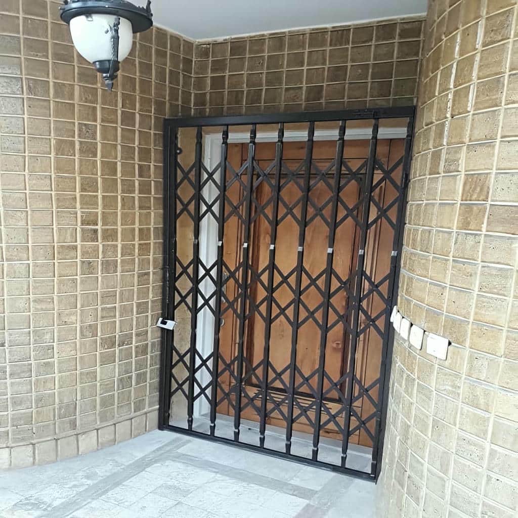 درب آکاردئونی حفاظ خانه در نوشهر