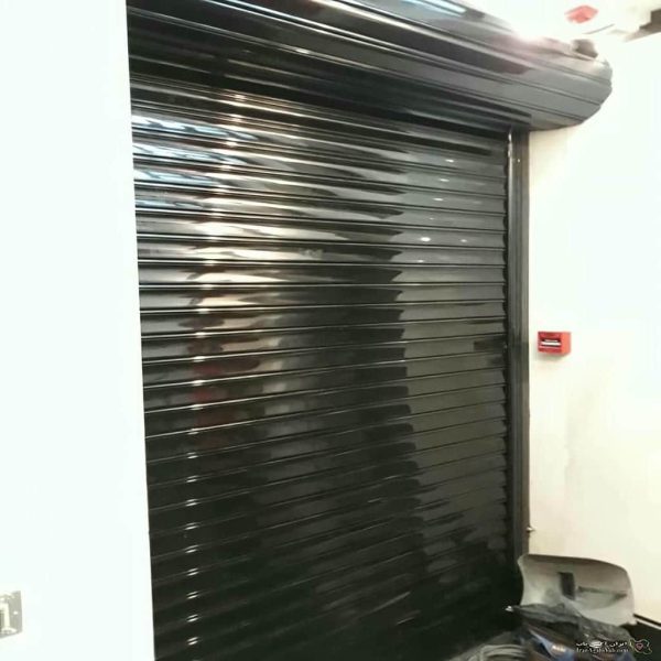حفاظ کرکره ای برقی پشت درب واحد آپارتمان