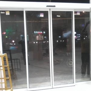 قیمت درب لولایی اتوماتیک شیشه ای