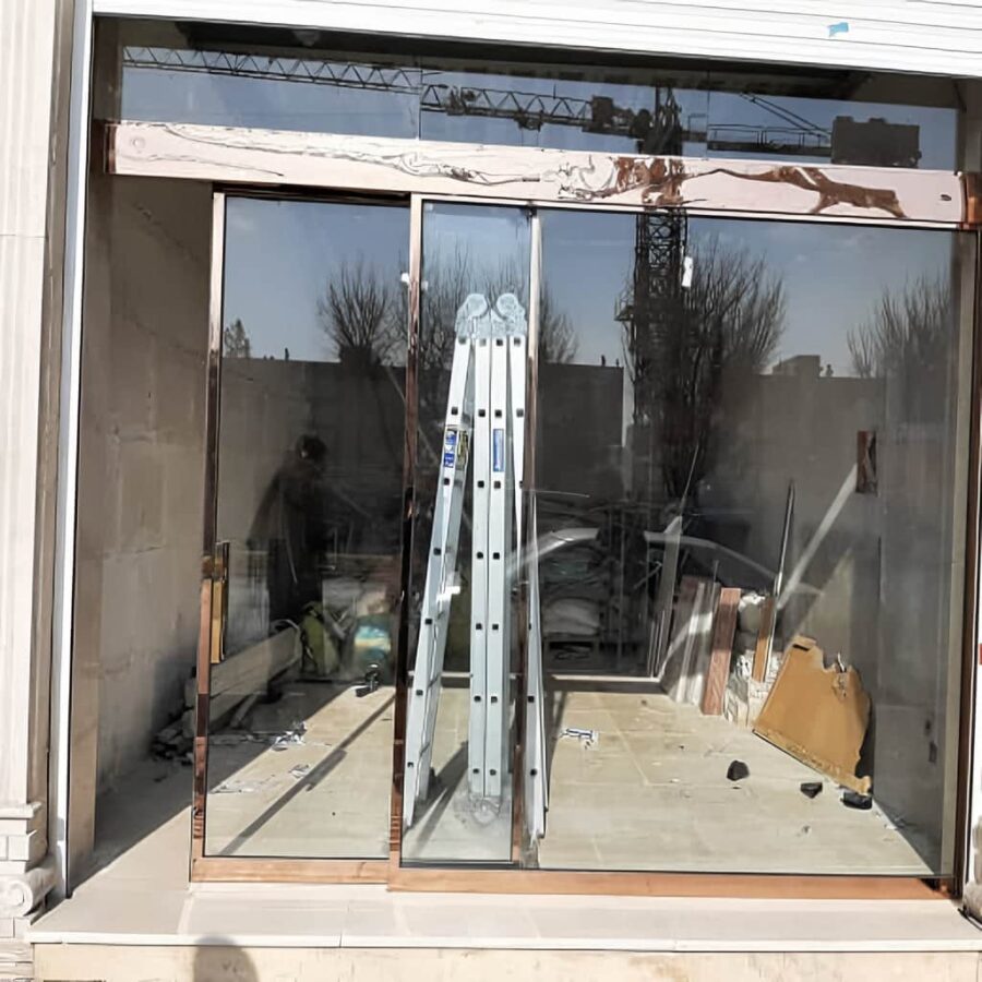 درب کشویی اتوماتیک شیشه ای با غلطک مقاوم