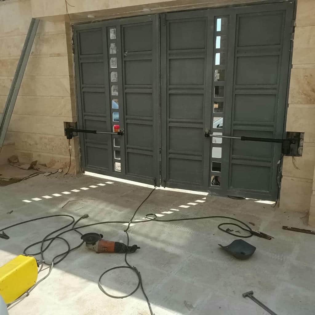 جک بازویی درب پارکینگ
