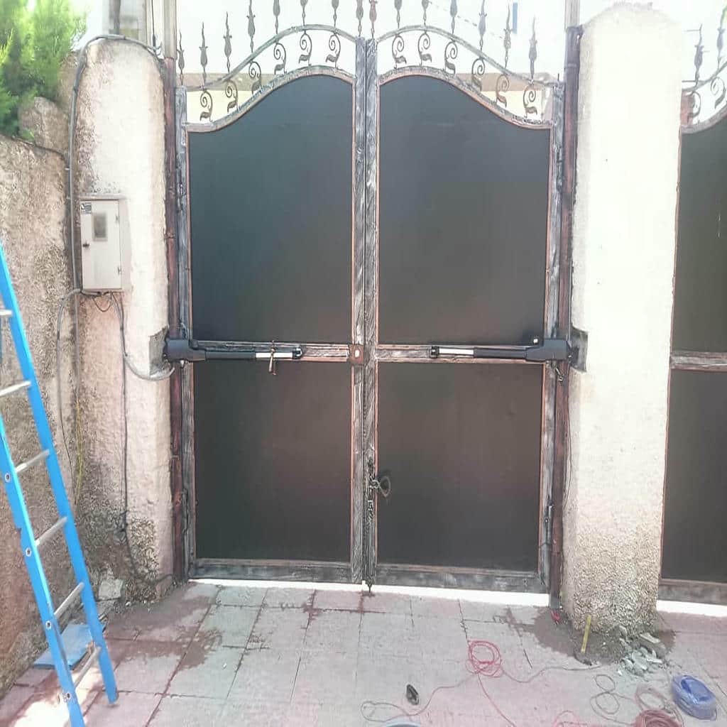 خدمات نصب درب برقی پارکینگ ریلی