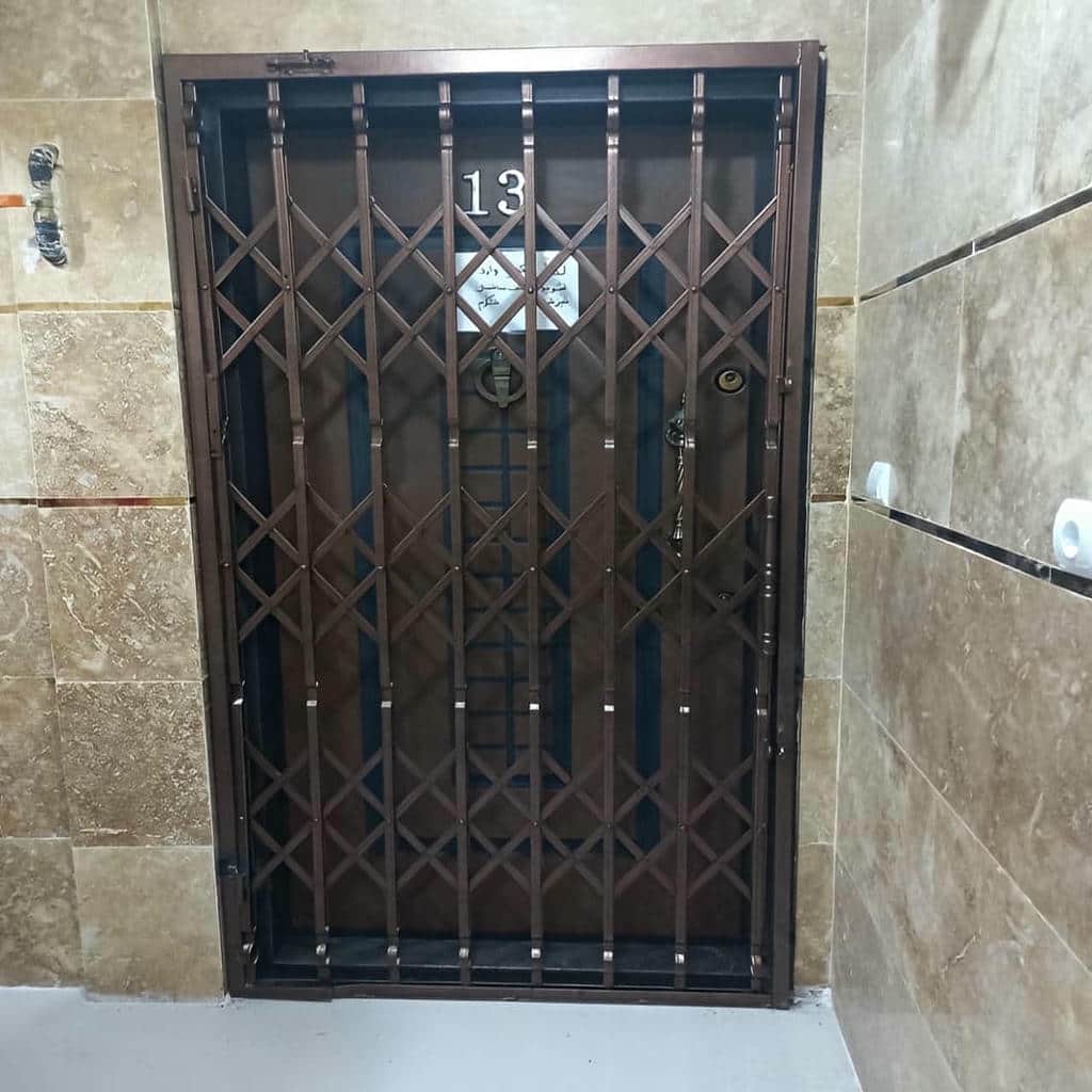 درب آکاردئونی آپارتمان فلزی ورودی ساختمان