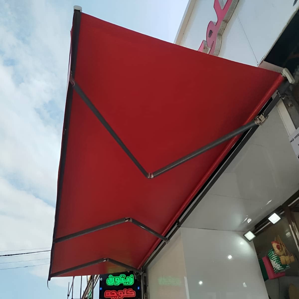 سایبان تراس برقی با پوشش مقاوم بارانی